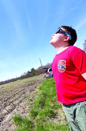 Shiloh Williams, 11, of Falmouth, viewed a total solar eclipse from Versailles, Ind. “It was amazing, to say the least,” Shiloh said. “Everything went dark in the middle of it.” Photo by Shiloh’s mom, Gina Gilbert.