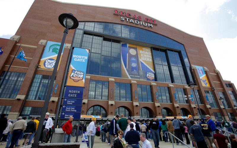 Fans arrive at Lucas Oil Stadium before a men's NCAA Final Four semifinal college basketball game between Butler and Michigan State Saturday, April 3, 2010, in Indianapolis. (AP Photo/Amy Sancetta)
