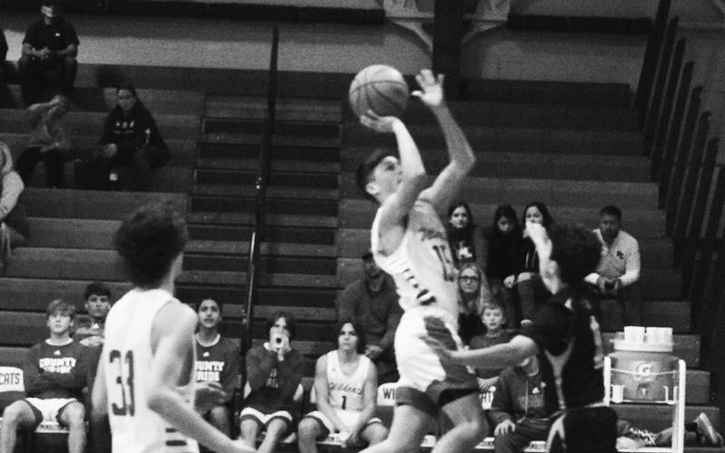 Freshman guard Dawson Nichols drives to the basket during the Wildcats home game versus Fleming County on December 6. Photo by Sam McClanahan