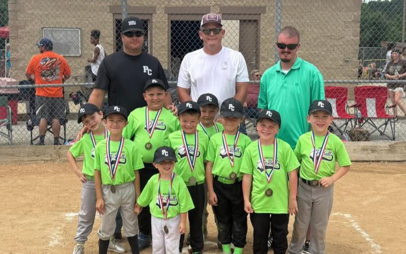 Pictured in front is Jack Miracle. Middle row left to right is Caleb Browning, Rowen Courtney, Denley Sturgill, Beckham Ross and Easton Stahl. Third row is Lewis Maddy, Wyatt Moore and Jameson Fields. The back row is the coaching staff of Jimmy Courtney, Zach Prewitt and Brandon Ross. Not pictured are Forrest Hanser, Jonah Hanser and Addie Jo Oldham. Photo courtesy of Caitlin Courtney.