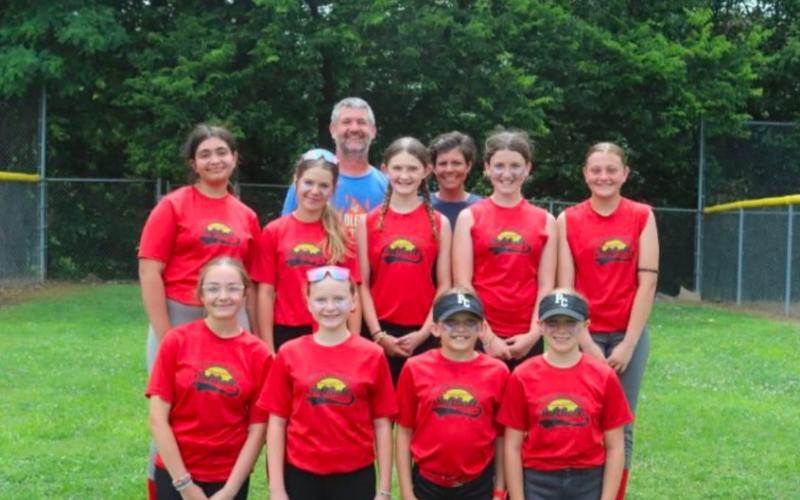 Team Blau, guided by Mark Blau and Kasey McCandless, recently won their age group championship through the Pendleton County Recreation. The team competed in the fast pitch division for grades 4-6. Photo provided by Hayley Daugherty.