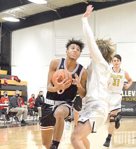 Tredyn Thomas drives against Bellevue. Photo by Sam McClanahan