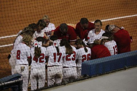 Ladycats say a team prayer before their semi-state game versus Boone County