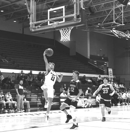Hunter Cox led the Wildcats with 22 points in their win over Manchester on December 9th. Photo by Sam McClanahan.