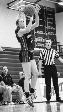 Ladycats junior Madison Verst puts up a jump shot in their road victory at Dayton. Photo by Pete Wigginton.