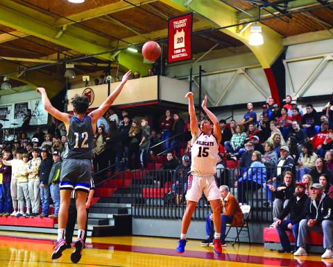 Sophomore Dawson Nichols fires a three-pointer from the corner. Scott defeated Pendleton County, 66-50. Photo by Sam McClanahan.