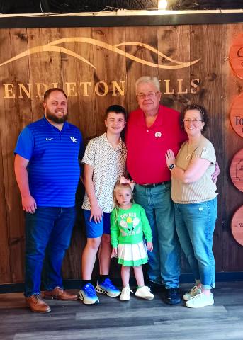 Presumptive Judge Executive-Elect Anthony Strong celebrates his election victory May 19 at the Pendleton Hills Clubhouse with family. From left are his son, Jackson, grandson Ben, granddaughter Lucy, Strong, and wife Teri. Photo by Sam McClanahan.