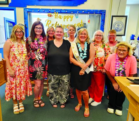 Spencer and her deputy clerks are, from left, Leah Huff, Kinley Scott, Robin Mulloy, Christina Monroe, Jill Tomlin, Spencer, Kathy Hendy, Michelle Brown and Carrie Bolen. 